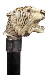 Ivory Tiger Dress Cane-Circa 1885-A museum quality: Ivory Tiger Dress Cane-Circa 1885-A museum quality carving with decorative applied ink lines, two color glass eyes, large signed sterling collar, ebony shaft and a bi-metal ferrule. Robert Hoe III