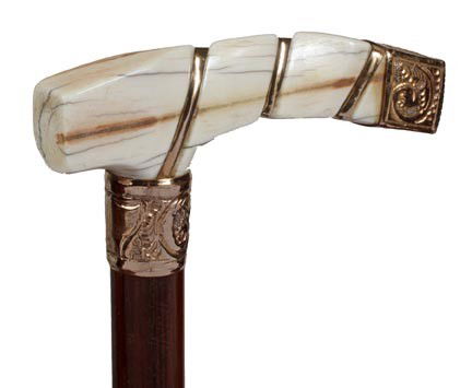 Ivory and Gold Dress Cane-Circa 1875-The handle ha: Ivory and Gold Dress Cane-Circa 1875-The handle has gold filled strapping and end cap, ornate collar, exotic wood shaft and a 2" horn ferrule-H. 5" x 1 ½", O.L. 35"-$300-$500