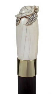 Ivory Turtle Cane-Circa 1940-A carved elephant ivo: Ivory Turtle Cane-Circa 1940-A carved elephant ivory turtle, gold medal collar, mahogany shaft and a horn ferrule-H. 1 ½" x 2 ¾", O.L. 36 ½"-$400-$600
