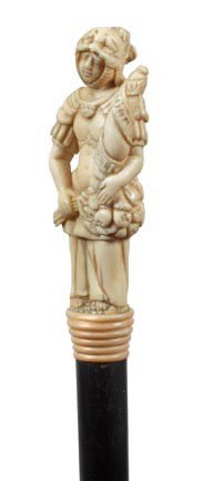 Carved Russian Ivory Cane-Circa 1890-A nicely carv: Carved Russian Ivory Cane-Circa 1890-A nicely carved Russian peasant lady done in great detail, ribbed ivory collar, ebony shaft and an ivory ferrule-H. 3 ¼" x 1 ¼", O.L. 35 ½"-$800-$1,000