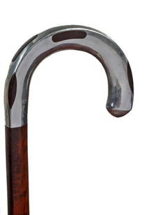 Art Deco Dress Cane-Circa 1930-An unusual one piec: Art Deco Dress Cane-Circa 1930-An unusual one piece snakewood triangle shaft, silver overlaid handle and a bi-metal ferrule-H. 4 ¾" x 3 ¼", O.L. 36"-$600-$900