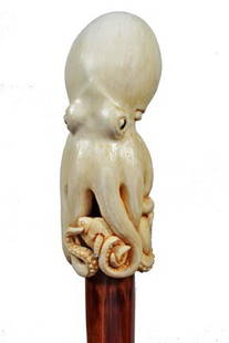 Ivory Octopus Cane- 20th Century-A custom carving: Ivory Octopus Cane- 20th Century-A custom carving by P. Lundberg, hexagonal cherry shaft and a hexagonal ivory ferrule-H. 4 ¾" x 2", O.L. 36"-$2,000-$2,500