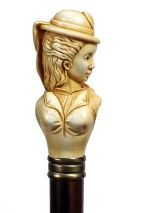 Ivory Victorian Bust Cane-Late 19th Century-A carve: Ivory Victorian Bust Cane-Late 19th Century-A carved ivory bust of what appears to be an African American lady with painted enamel eyes, ribbed brass collar, ebony shaft and a horn ferrule-H. 3" x 1 �
