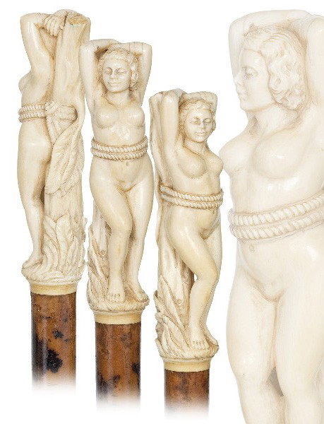 French Ivory Nude Cane-Late 19th Century-A substant: French Ivory Nude Cane-Late 19th Century-A substantial ivory handle with a standing naked Venus tied against a tree, malacca shaft and a metal ferrule. Master carving with great and naturalistic detai