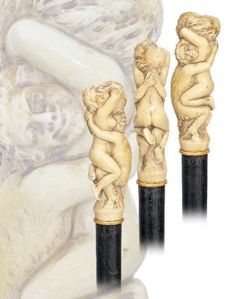 French Erotic Ivory Cane-Late 19th Century-A sizea: French Erotic Ivory Cane-Late 19th Century-A sizeable ivory handle with a Pan embracing a naked Venus, ebony shaft and a metal ferrule. The depiction is well rendered with a magnificent body to the Ve