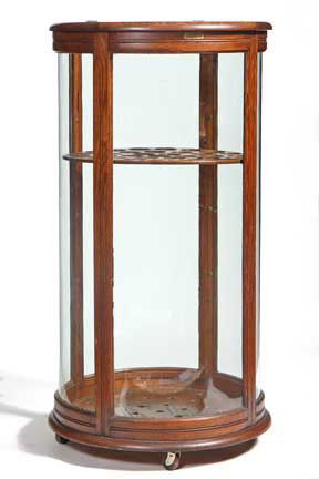 Rare Round Oak Cane Case-Circa 1900-An Oskar Onkin: Rare Round Oak Cane Case-Circa 1900-An Oskar Onkin oak cane case in wonderful condition. The case has a lift top and also a door in the rear. There are 38 holes for canes but this case could be double