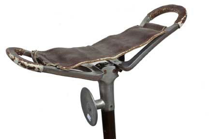 Shooters Stool System Stick Cane-Circa 1935-A leat: Shooters Stool System Stick Cane-Circa 1935-A leather and metal folding seat cane in working condition, hardwood shaft and a spike ferrule-H. 4" x 6", O.L. 36"-$200-$250