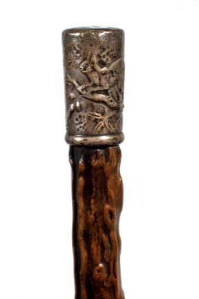Sterling Dress Cane-Circa 1885-Engraved signed ste: Sterling Dress Cane-Circa 1885-Engraved signed sterling handle with a squirrel on a branch, exotic wood shaft and a metal ferrule-H. 1 ¾" x 7/8", O.L. 34"-$100-$200