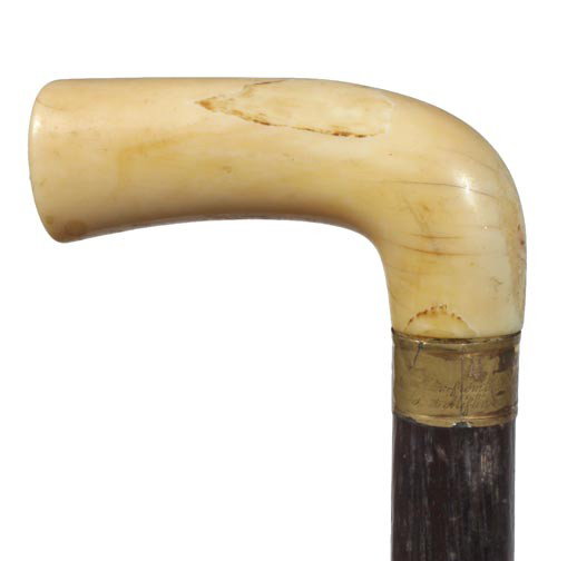 Antique nautical British Frigate ship cane: 60. A nautical 3 ½" x 1 ¾" ivory handle, inscribed collar, "Irish oak from British Frigate Augusta sunk off Fort Miflin on the Delaware River Dec. 23rd 1777", 33 ¼" O.L., 2 ½" brass and iron ferru