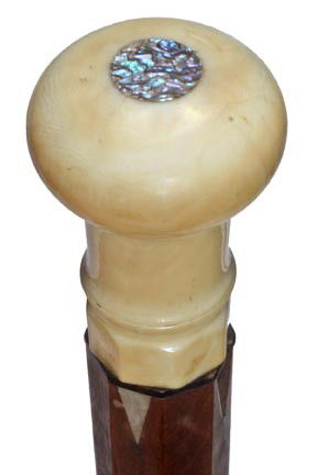 Antique cane and collectable walking stick: 73. A Nautical 2 ¼" x 1 ½" whale's tooth handle, inlaid abalone disc atop, small baleen spacer, mother of pearl pyramid inserts (missing one), hexagonal to cylinder walnut shaft with M.O.P. inlays,