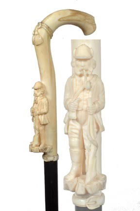 Antique cane Ivory hunter gun: 105. A Victorian 3 ½" x 6 ¾" ivory hunting handle, carved belt ivory collar, ebony shaft, 34" O.L., ivory and metal ferrule-$600-$900