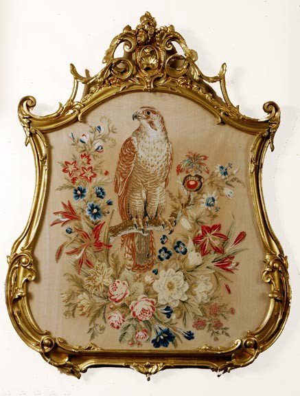 104. French Needlepoint-19th Century-Hawk/ Falcon: 104. French Needlepoint-19th Century-A classical French needlepoint which has a hawk sitting upon a branch among many colorful flowers, ornate restored gilt frame-31" x 39"-$1,500-$2,000