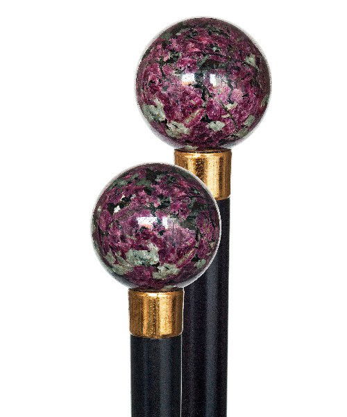 28. Hard Stone Dress Cane-Late 19th Century-A polis: 28. Hard Stone Dress Cane-Late 19th Century-A polished ball with a crystallized structure and of variegated red and black colors probably being corundum (ruby), gilt collar, ebony shaft and a horn fer