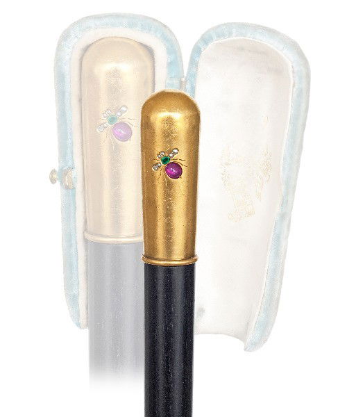 127. French Dual Purpose Jeweled Gold Dress Cane-: 127. French Dual Purpose Jeweled Gold Dress Cane- Late 19th Century-Heavy 18 karat yellow gold knob (0,7 ounce) set with a ruby, emerald and diamonds in the shape of an insect on a deep black ebony sh