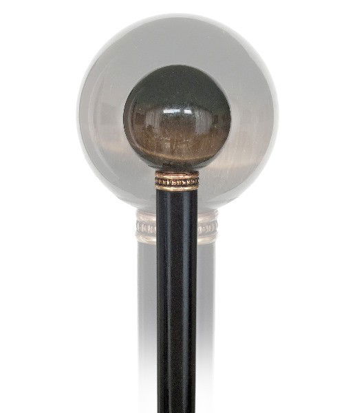 155. Hard Stone Dandy Cane-Late 19th Century-Falco: 155. Hard Stone Dandy Cane-Late 19th Century-Falcon eye ball knob of shimmering brown color, ebony shaft with a beaded metal collar and a horn ferrule-H. 1 ½" x 1 ½", O.L. 36 ½" -$400 - $600