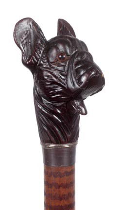 208. Carved Wood Glove Holder Cane-Early 20th Cent: 208. Carved Wood Glove Holder Cane-Early 20th Century-A better than average carving with two color glass eyes, push button lower jaw mechanism, metal collar, paint decorated shaft and a horn ferrule-H