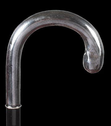 23. Art Deco Silver Dress Cane-Circa 1925-A signed: 23. Art Deco Silver Dress Cane-Circa 1925-A signed 800 silver handle 4 ½" x 4 ½" with hexagonal checkering, ebony shaft, dents and dings and a bi-metal ferrule-O.L. 37"-$300-$400