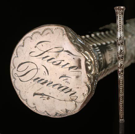 29. Gold Filled Dress Cane-Circa 1890-An 1 ¼" x 11": 29. Gold Filled Dress Cane-Circa 1890-An 1 ¼" x 11" gold filled presentation from "Suzie to Duncan", metal collar, ebony shaft and metal ferrule, average dents and dings to handle-O.L. 36"-$300-$500