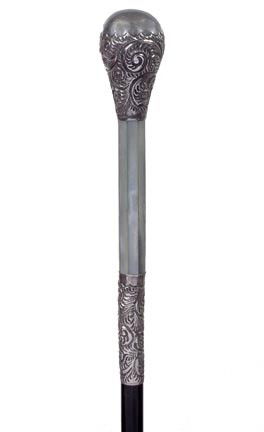 35. Sterling Dress Cane-Circa 1900-A signed sterlin: 35. Sterling Dress Cane-Circa 1900-A signed sterling 1 ¼" x 2" handle, hexagonal abalone spacer, ornate 2" silver collar, ebonized shaft and a horn ferrule-O.L. 36"-$300-$500