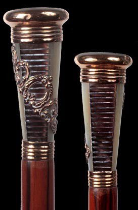 65. Fancy Dress Cane-Circa 1900-An unusual 2 ½" x 1: 65. Fancy Dress Cane-Circa 1900-An unusual 2 ½" x 1 ¼" gold filled-mother of pearl-abalone handle, ornate rose gold filled cartouche, ribbed gold collar, exotic wood shaft and a horn ferrule-O.L. 35