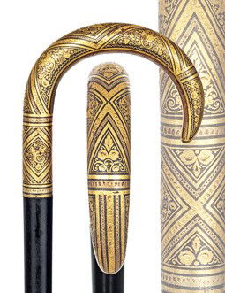 Toledo Dress Cane-Spain, circa 1885-A remarkable T: Toledo Dress Cane-Spain, circa 1885-A remarkable Toledo steel crook handle with dense 24 karat yellow gold Damascene work with the usual arabesque and trellises within mul­tiple frames, ebony shaft a