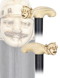 Ivory Trojan Cane-European 19th Century-Carved ivo: Ivory Trojan Cane-European 19th Century-Carved ivory with a helmeted warrior head, ebony shaft with a long staghorn ferrule. Attractive character lines and well-aged surface to the handle.-H. 4 3/4" x