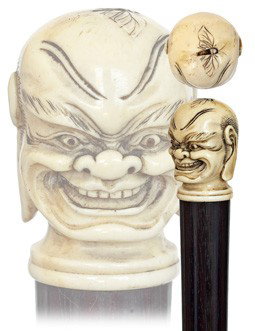 Immortal Lucky God Cane-Japan, late 19th Century-I: Immortal Lucky God Cane-Japan, late 19th Century-Ivory portrait of Fukurokuju (from Japanese "fuku" happiness, "roku" wealth, and "ju" longevity) with an insect on his bald head, rose­wood shaft and 