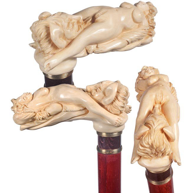 46. Erotic Ivory Russian Cane-Early 20th Century-A : 46. Erotic Ivory Russian Cane-Early 20th Century-A finely carved ivory handle featuring the Devil and a nude lady, the collar is gold and guilloche with the hallmarks of Erik Kollin, House of Faberge 