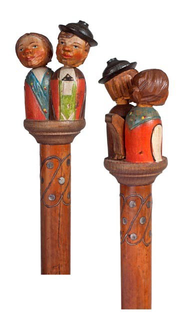 93. Kissing Couple German Cane- Early 20th Century-: 93. Kissing Couple German Cane- Early 20th Century- A carved and painted couple with a rear lever that raises the heads of the couple and makes them kiss, malacca shaft with silver inlay and a brass f