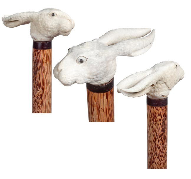 99. Carved Rabbit Antler Cane- Early 20th Century-: 99. Carved Rabbit Antler Cane- Early 20th Century- A whimsical carved, probably moose antler rabbit, bone collar, exotic wood shaft and a bone ferule. H. 1 ½" x 3 ½", O.L. 38 ½", $400-$600