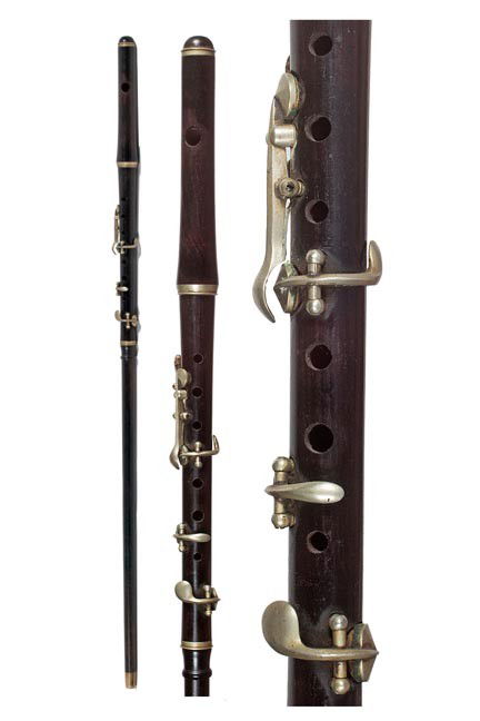 128. Flute/Piccolo System Stick-Circa early 20th C: 128. Flute/Piccolo System Stick-Circa early 20th Century-An ebony piccolo with nickel silver keys which detaches from its custom shaft and can be played, nice condition, been together for a long time