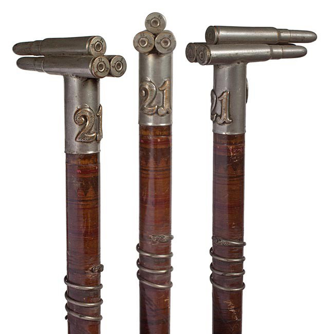 140. Prussian Soldiers Cane-Early 20th Century-Thr: 140. Prussian Soldiers Cane-Early 20th Century-Three original cartridges attached to a collar which is marked on one side 21, probably from the regiment and the other side with a 6, "Keleruilf Bale 6 
