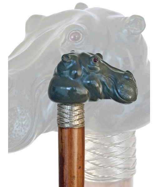 17. Figural Hardstone Cane - Circa 1890- Muddy green ja: 17. Figural Hardstone Cane - Circa 1890- Muddy green jasper hippopotamus head on a malacca shaft with a braided silver wire collar and a white metal ferrule. The joyous flair of the amphibious animal