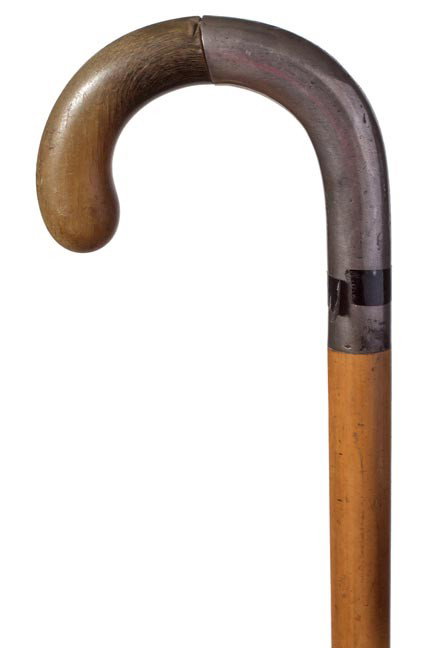 61. Horn and Silver Dress Cane-Late 19th Century-Possib: 61. Horn and Silver Dress Cane-Late 19th Century-Possibly Rhino, a blend of horn and silver on a crutch handle which has a small unreadable touch mark, malacca shaft and no ferrule-H. 4" x 3", O.L. 34