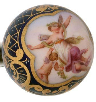 29. Porcelain Dress Cane-Late 19th Century-A well execu: 29. Porcelain Dress Cane-Late 19th Century-A well executed painted porcelain handle with heavy moriage work, ornate brass collar, ebony shaft and a horn ferrule-H. 1 ½" x 1 ½", O.L. 35 ½"