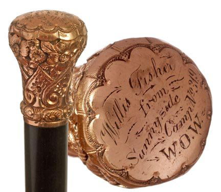 99. Gold Filled Dress Cane-Early 20th Century-A W.O.W. : 99. Gold Filled Dress Cane-Early 20th Century-A W.O.W. presentation cane made by Simmons, ebony shaft and a bi-metal ferrule. H. 1 ¼" x 1 ¼", O.L. 35"