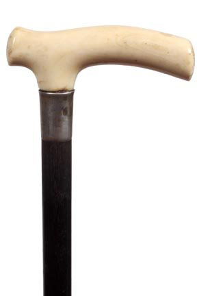 124. Ivory Dress Cane-Late 19th Century-An ivory tau ha: 124. Ivory Dress Cane-Late 19th Century-An ivory tau handle with normal striations, coin silver collar, ebony shaft and a 3" replaced ferrule. H. 4 x 1 ¾", O.L. 30"