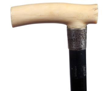 127. Ivory Dress Cane-Dated 1905-A nice ivory handle, h: 127. Ivory Dress Cane-Dated 1905-A nice ivory handle, hallmarked silver British Collar J. H., ebony shaft and no ferrule. H. 4" x 1 ¼", O.L. 35 1/2