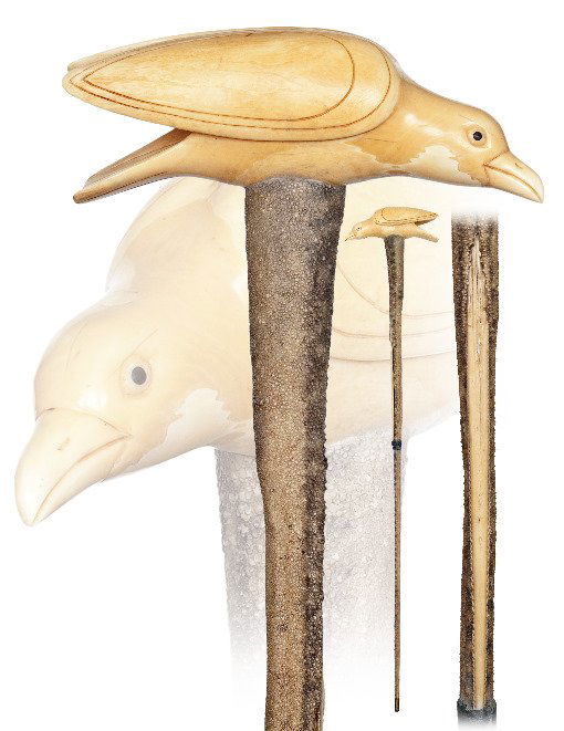 45. One-of-a-kind Nautical Cane-Mid. 19th Century.-A wh: 45. One-of-a-kind Nautical Cane-Mid. 19th Century.-A whale tooth handle carved as stylized bird and attached to a shaft made of a Dasyatis Sephen stingray tail. This cane was probably put together by