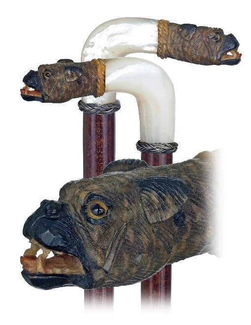 71. Figural Day Cane- Ca. 1890-L-shaped mother of pearl: 71. Figural Day Cane- Ca. 1890-L-shaped mother of pearl handle with a rhino horn French Bulldog at the end. The canine head shows fine detail including sharp teeth, inset glass eyes and a carved cord 