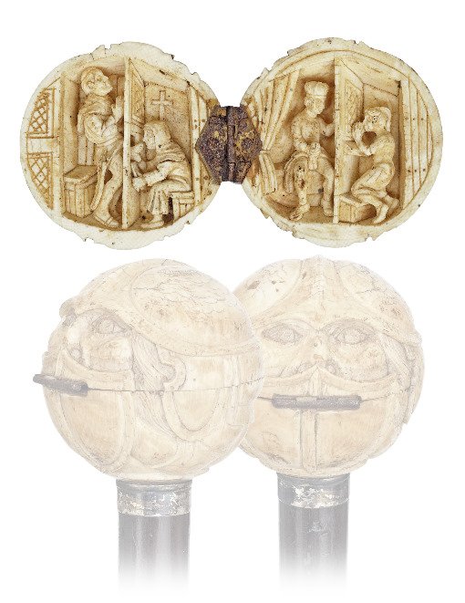 73. Erotic Ivory Cane-Ca. 1880-This is one of the best : 73. Erotic Ivory Cane-Ca. 1880-This is one of the best carvings that we have seen in this style of erotic hinged ball canes. The ball shows what seems to be a helmeted warrior’s head and the two sce