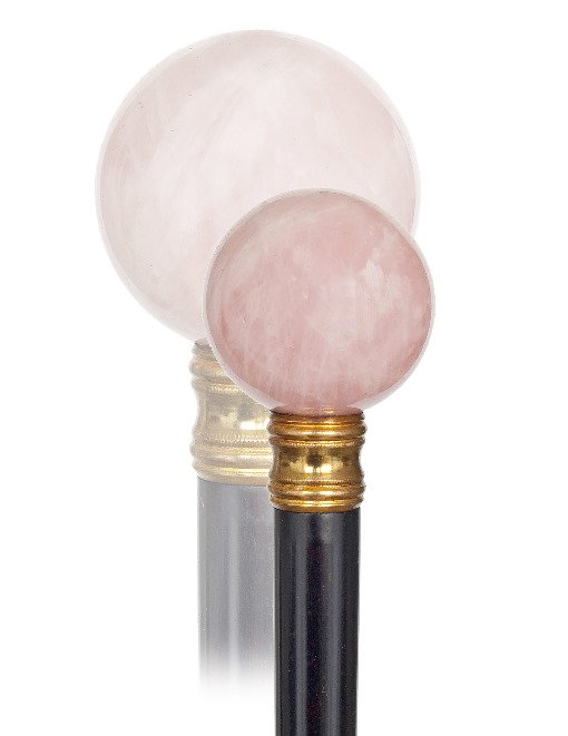 77. Rose Quartz Dress Cane-Early 20th Century-Polished : 77. Rose Quartz Dress Cane-Early 20th Century-Polished translucent rich pink color, ebony shaft with gilt metal collar and a horn ferrule. H. 1 ¾” x 1 ¾”, O.L. 39 ¼”