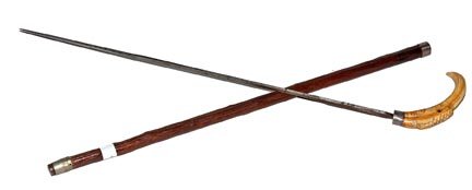 124. Hog Ivory Sword Cane-Early 20th Century-A carved t: 124. Hog Ivory Sword Cane-Early 20th Century-A carved tusk with two color glass eyes, white metal spring collars with a 25” two sided blade which has blood grooves, natural branch shaft and a metal 