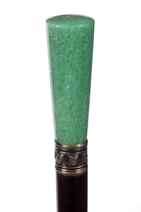 28. Aventurine Quartz Dress Cane -Early 20th Century- S: 28. Aventurine Quartz Dress Cane -Early 20th Century- Substantial shimmering green aventurine quartz French handle with a chased silver collar and ebony shaft with a horn ferrule. H. 3" x 1 ¼", O.L.