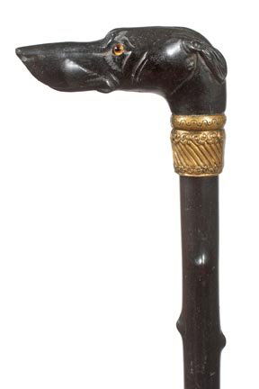 31. Carved Ebony Dog Cane-Ca. 1890-A very nicely carved: 31. Carved Ebony Dog Cane-Ca. 1890-A very nicely carved dog with two color glass eyes, ornate brass collar, a very unusual twig spur ebony shaft and a brass ferrule-H. 3" x 1 ¼", O.L. 35 ½"-