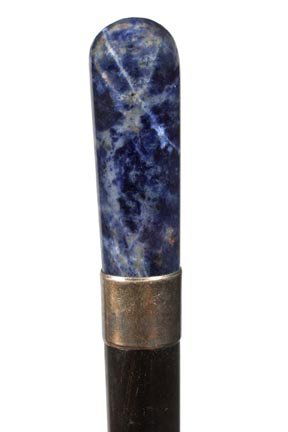 138. Hard Stone Dress Cane-Ca. 1935-A nice probably lap: 138. Hard Stone Dress Cane-Ca. 1935-A nice probably lapis handle, silver metal collar, ebony shaft and a horn ferrule-H. 1” x 2 ¾”, O.L. 37”-