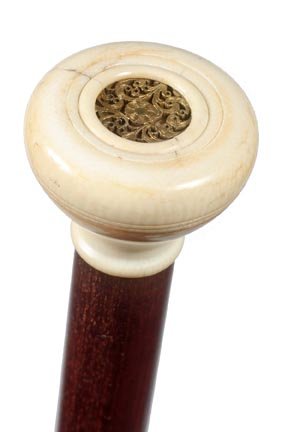 289. Pomander Ivory Cane-Ca. 1880-An ivory compartment : 289. Pomander Ivory Cane-Ca. 1880-An ivory compartment handle which has a gold filigree scent screen, snakewood shaft and a metal ferrule-H. 1 3/8” x 1 ¼”, O.L. 34”-