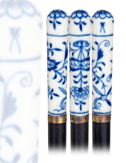103. Meissen Porcelain cane-Early 1900s-Straight w: 103. Meissen Porcelain cane-Early 1900s-Straight white porcelain handle decorated in cobalt blue with the classic, Zwiebelmuster onion pattern, ebony shaft with a gilt collar and a brass ferrule. This