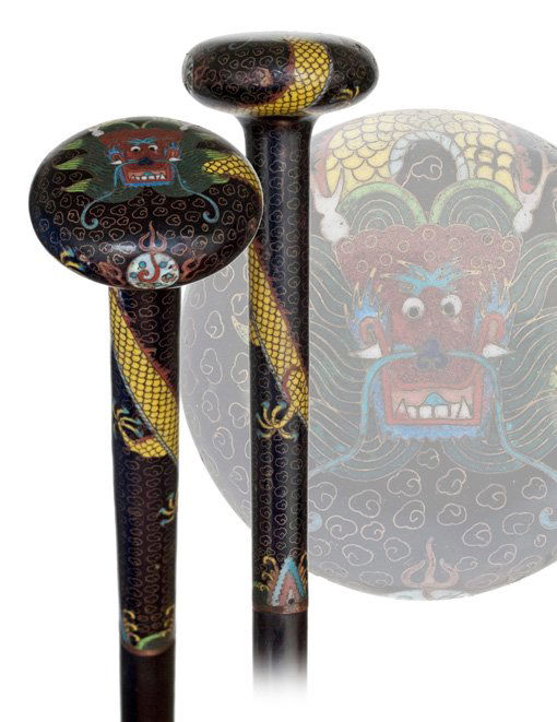 118. Cloisonne Enamel Cane-Ca. 1890-Shippo ename: 118. Cloisonne Enamel Cane-Ca. 1890-Shippo enamel handle with a long and tapering stem topped by a round and widening, flat knob. The knob is decorated with a golden yellow dragon which coils on the s