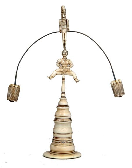 228. Erotic Ivory Balance Toy- 20th Century -A Pun: 228. Erotic Ivory Balance Toy- 20th Century -A Punch and Judy erotic ivory balance toy with Punch having moveable arms, on the end of the balance is a carving of a basket of fruits, great details is g